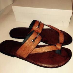 Brown leather palm sleepers with chain